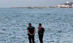 Polisten kaçarken denize atladı