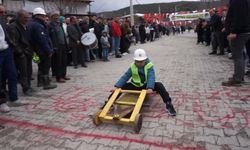 40 Yarışmacı, 2 KM parkur: Tahta arabalar geri döndü
