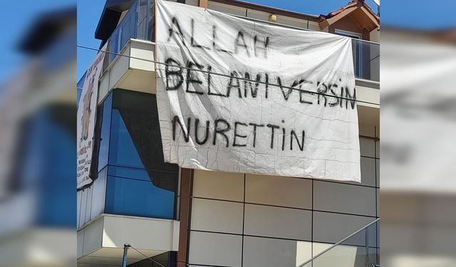 Binaya asılan pankart görenleri şoke etti